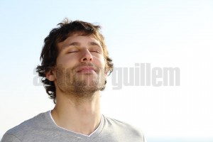 Attractive man breathing outdoor