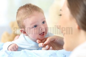 Happy baby and mother looking each other (2)