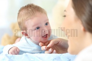 Happy baby and mother looking each other (3)