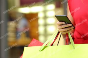 Shopper shopping with a smart phone (1)