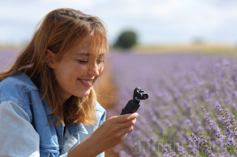 Woman recording a video in a lavender field