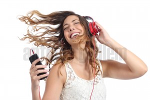 Happy girl dancing and listening to the music (1)